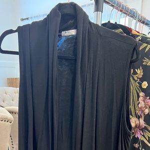 Size L. Sleeveless black tunic